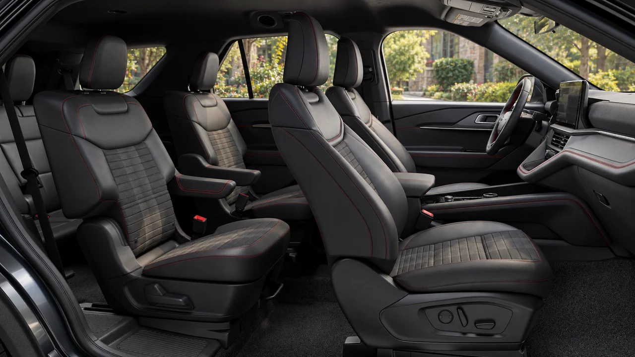 AI-generated illustration of the 2027 Explorer ST-Line black cabin with red stitching and second-row captain's chairs