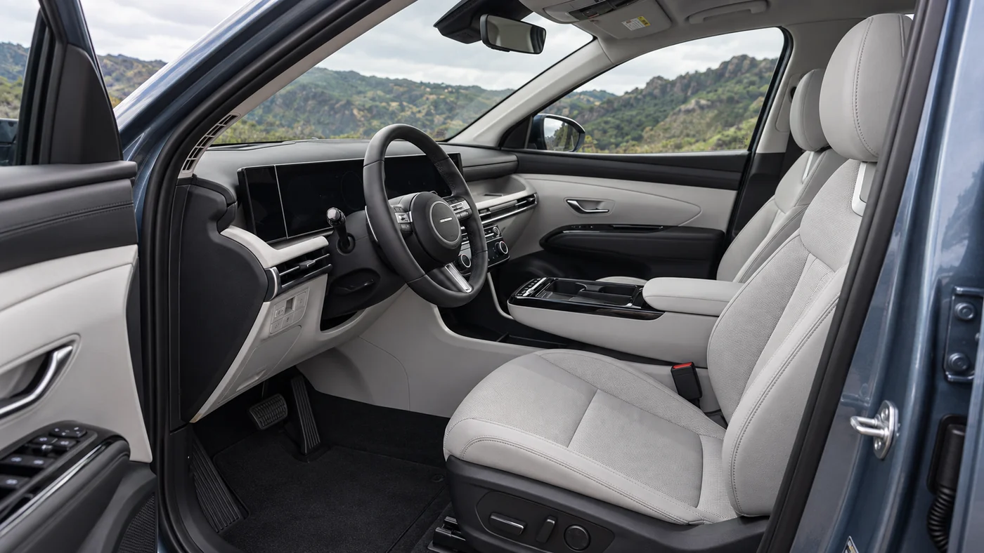 AI illustration of the Tucson Limited driver seat, steering column and center console