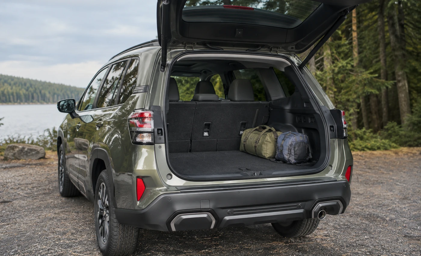 Subaru Forester-style SUV with the rear hatch open and cargo area visible