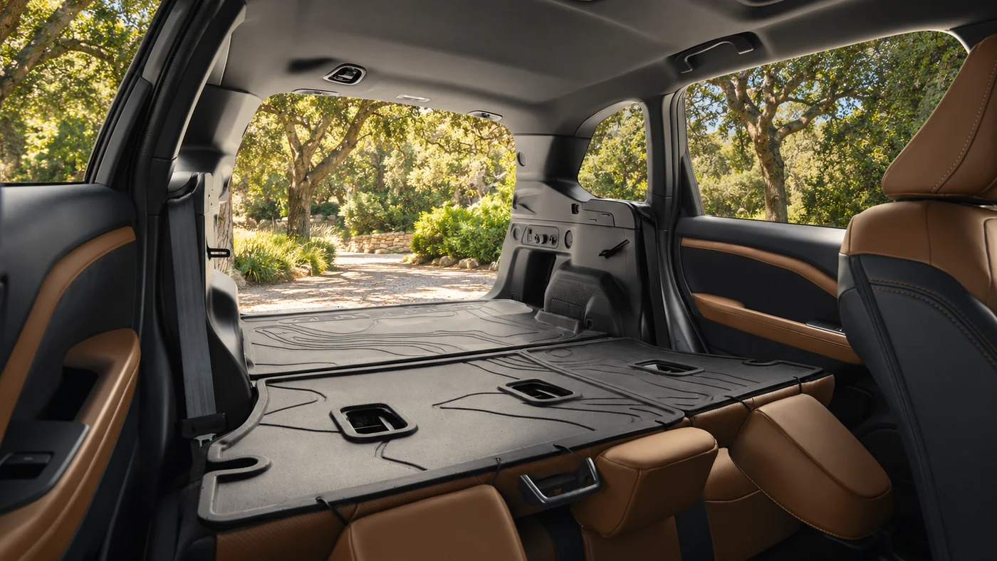 AI-generated illustration of a 2026 Subaru Forester brown cabin with rear seats folded and accessory cargo protectors