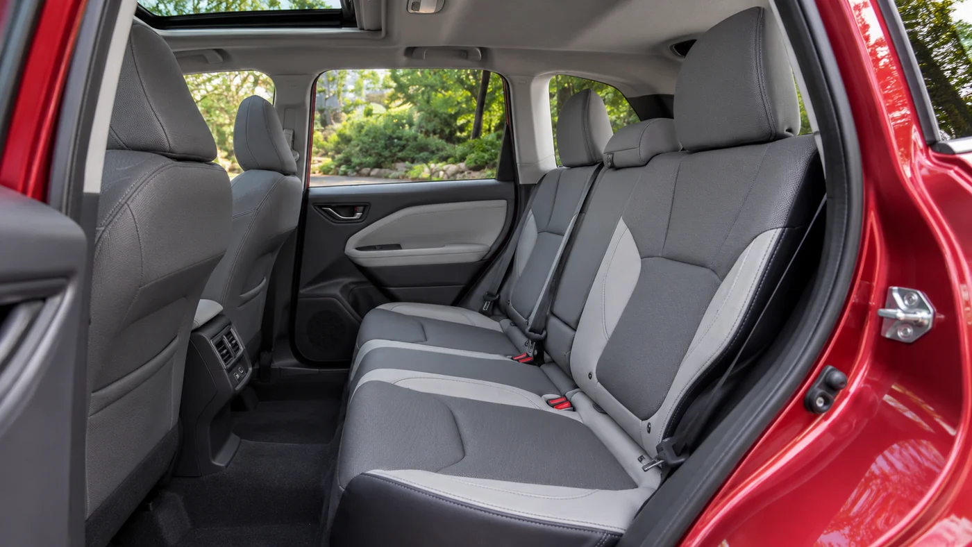 AI-generated illustration of a 2026 Subaru Forester gray rear bench and footwell viewed through an open rear door